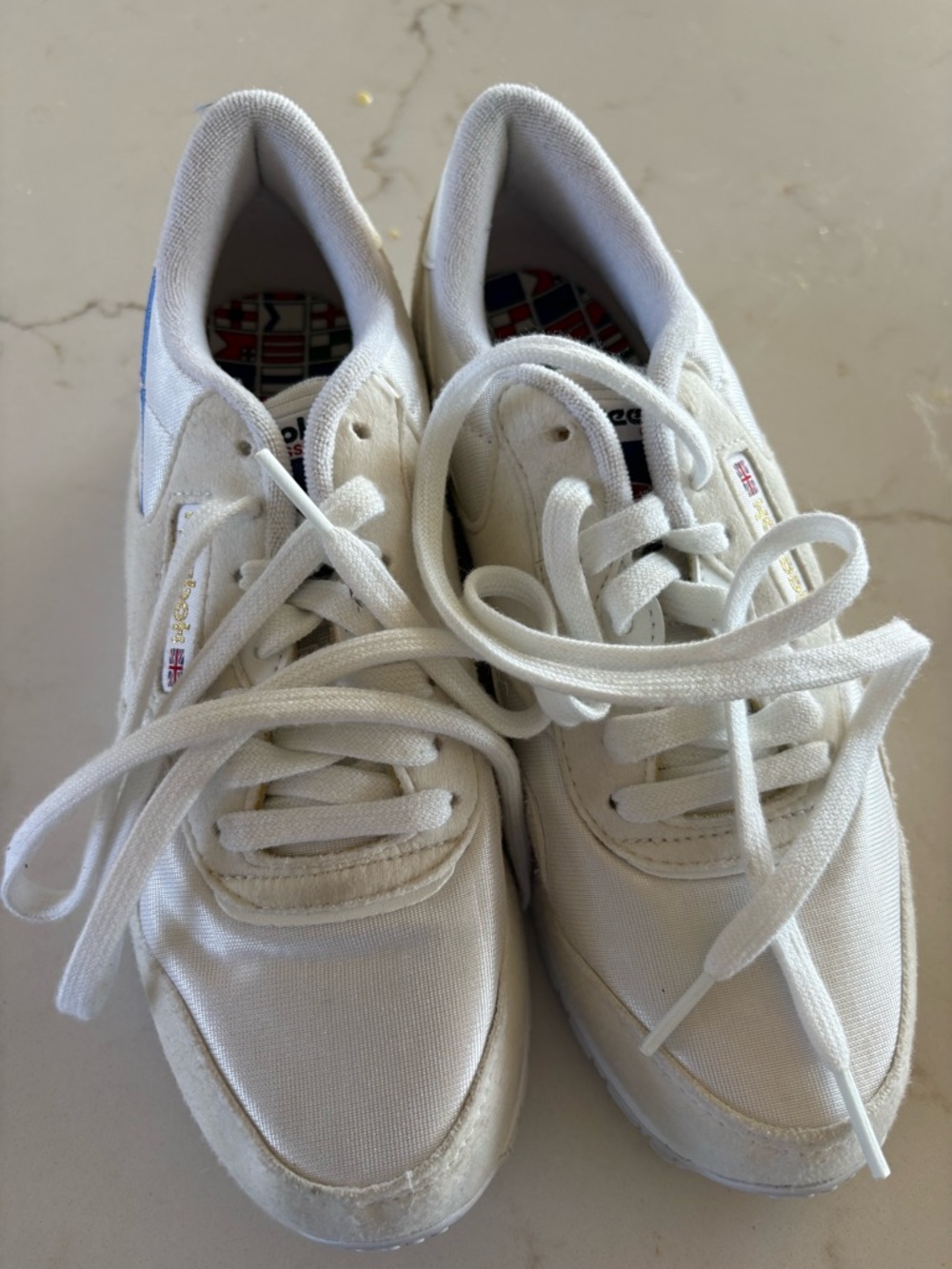 Reebok White Sneakers with Blue Heel Accent